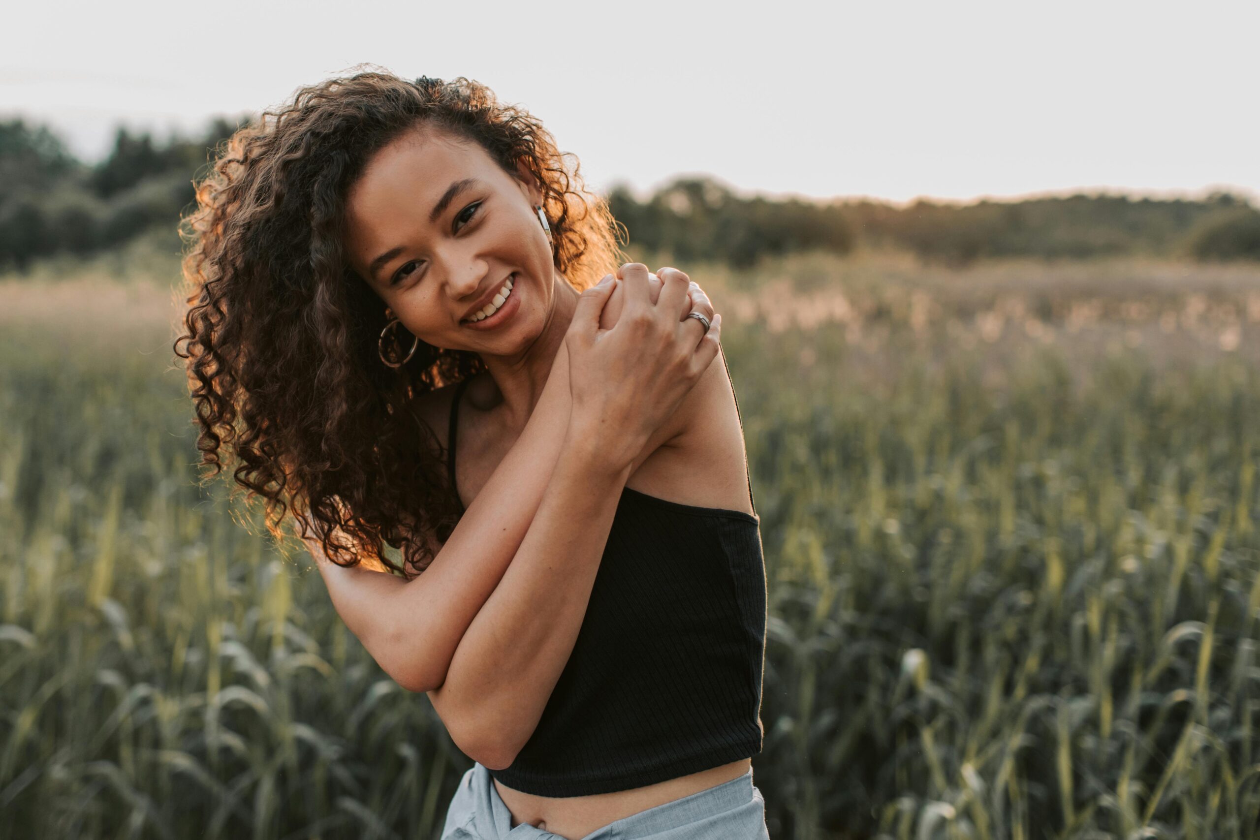 Person embracing intentional rest for mental health and productivity – Joy Spring Mental Health
